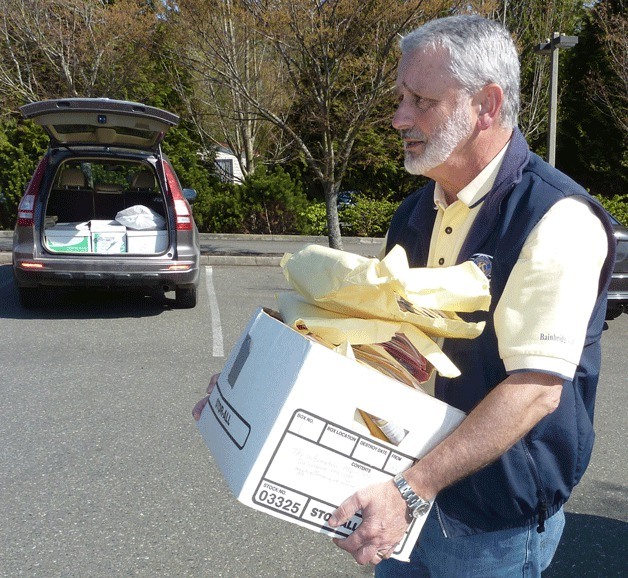 An islander brings a load of paperwork to ShredFest