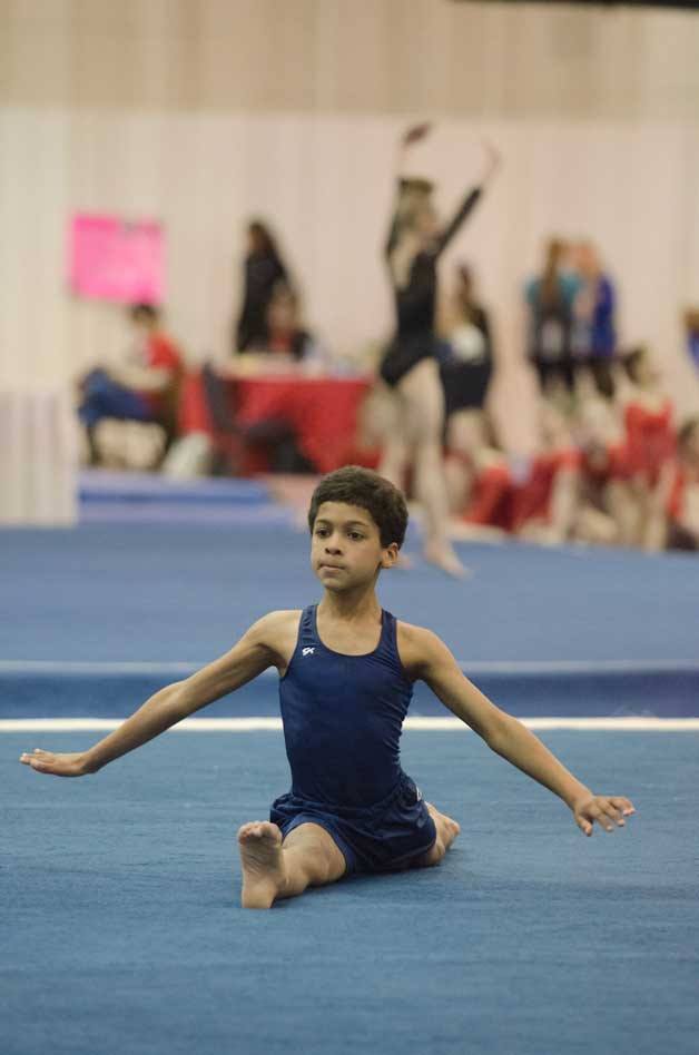 Jayden Wood Johnson competes in the floor exercise during the Rose City Challenge.