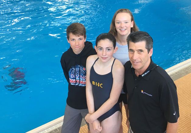 Members of the Bainbridge Island Diving Club gather for a photo during the recent US Diving Championships. In front is Brian Taylor
