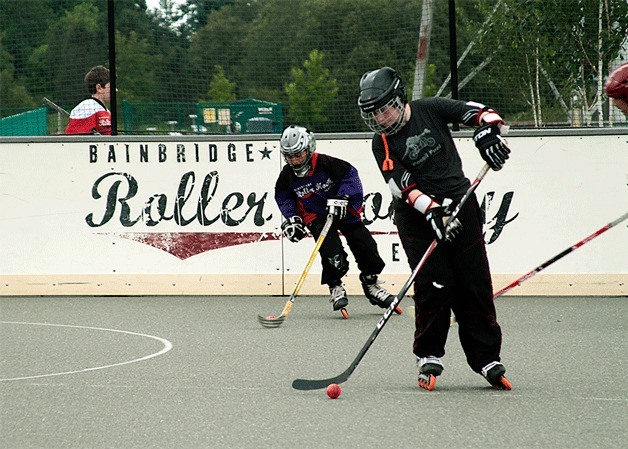 Two young players work through a practice session at Battle Point Park Tuesday