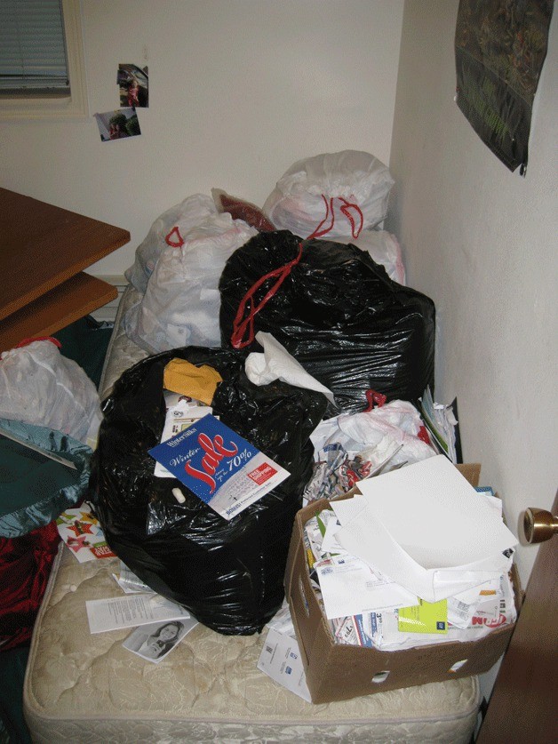 Trash bags full of stolen mail were allegedly found throughout Adam J. Lysiak’s apartment.