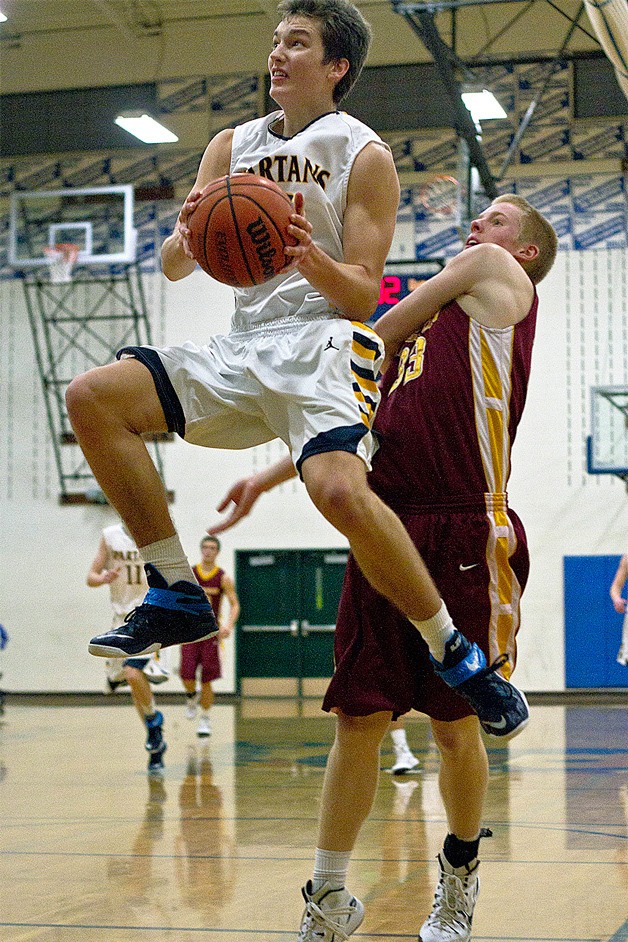 BHS senior wing Dawson Gonwick leaps for a layup during Saturday’s home game against Kingston.