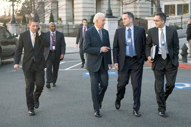 Vice President Joe Biden walks across West Executive Avenue with Ben Harris and Don Graves on Dec. 17