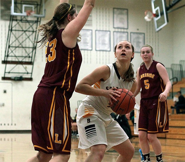 Spartan senior post Kayla Buchmeier looks for a opportunity to take a shot late in Wednesday’s home game.