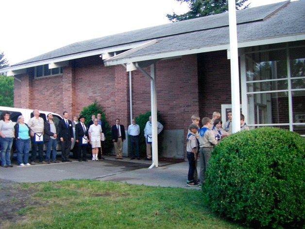Members of Boy Scout Troop 1496 raised the flag on the refurbished flagpole at the William Renton Lodge No. 29 F. & A. M. (Masons)