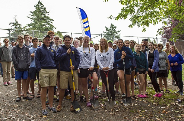 The gathered crowd of rowers are all smiles as they ready to break ground on the new Bainbridge Island Rowing Center in Waterfront Park Friday