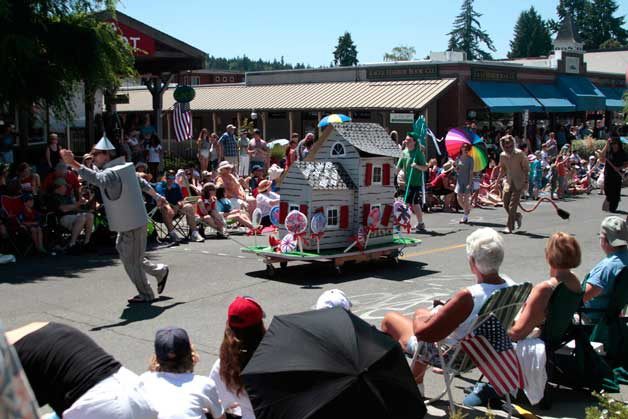 Keep it on the Rock promotes its Ruby Shoes shoe drive during the Fourth of July parade in Winslow.