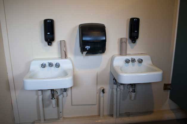 Vandals have repeatedly torn down soap and towel dispensers — like the ones seen in this photo — at Battle Point Park over the last few years. After costing the parks department thousands of dollars