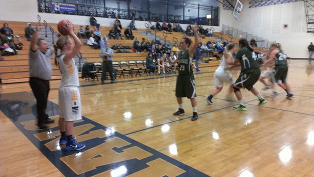 The Spartans inbound the ball during Bainbridge's win over Port Townsend.