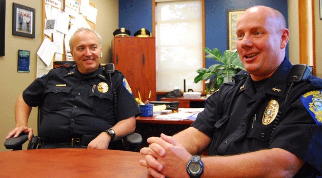 Bainbridge Island Police Chief Matthew Hamner sits with newly appointed Deputy Chief Jeffrey Horn. The new second-in-command joined Bainbridge ranks this week from the Indianapolis Metropolitan Police Department.