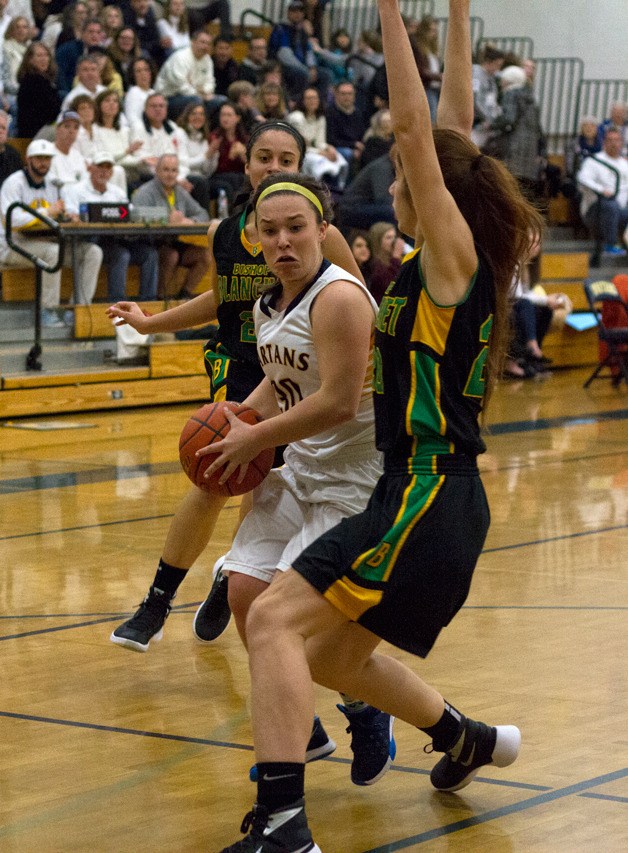 BHS sophomore Madeline Loverich drives around a defender from Bishop Blanchet in Friday’s game.