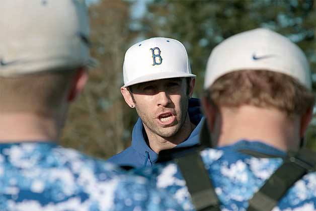 Newly appointed BHS varsity baseball team Head Coach Simon Pollack talks with the Spartans after their 11-0 shutout defeat of Port Angeles.