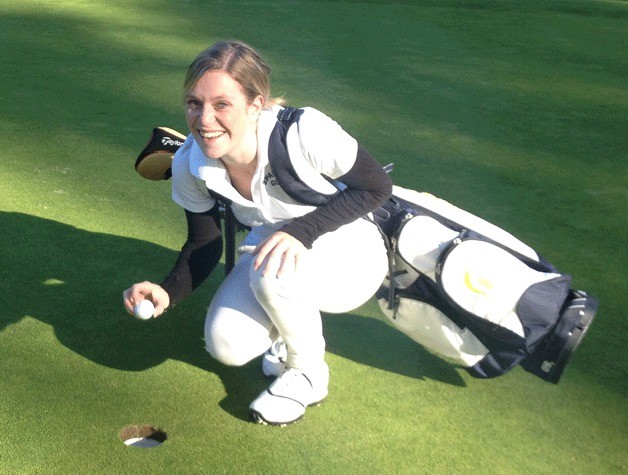 Bainbridge High School girls golf team member Mary Boynton scored a hole in one on the par three hole number five at the Wing Point Golf Course during a game against Lakeside High School Thursday