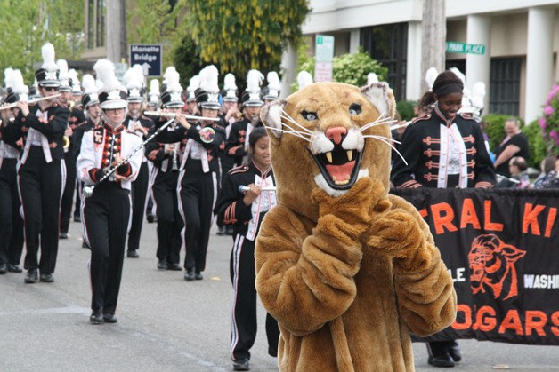 Central Kitsap High School Marching Band and their mascot perform in a previous Armed Forces Day Parade. Lining up bands is a big task for the Kiwanis.