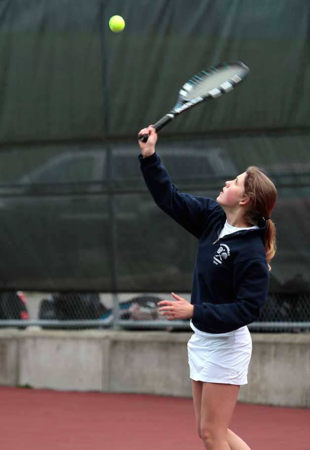 Raya Deussen serves during the Girls Doubles No. 2 last week as the Bainbridge High team earned its second win of the season.