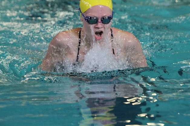 Allison Murphy helps her team wrap up a first-place finish in the 200-yard breaststroke relay.