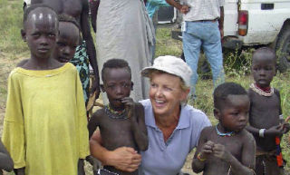 Islander Lori Sweningson with members of the Hamar tribe in Ethiopia.
