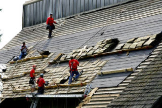 Workers from Hanson’s Roofing were busy this week at the First Baptist Church on State Route 305 and Madison. The church is replacing its aged cedar-shake shingle roof with new shingles.