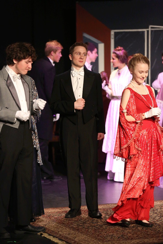 Tyler Beemer plays Dumby (left) with Quinn Balas as Lord Windermere (center) and Christina Goessman as Ms. Erlynne (right) in the BHS production of 'Lady Windermere's Fan.'