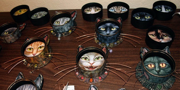 Artist Jeff Haynie’s Kitty Kans are as varied as the subjects he paints in his recycled cat-food cans.