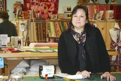 Barbara Kirk is the happy new owner of Esther’s Fabrics at 181 Winslow Way