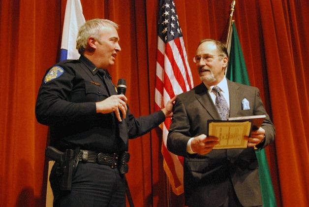 Recently retired officer Richard Christopher is awarded 2012 Officer of the Year for  his longstanding committment to the department as a field training officer