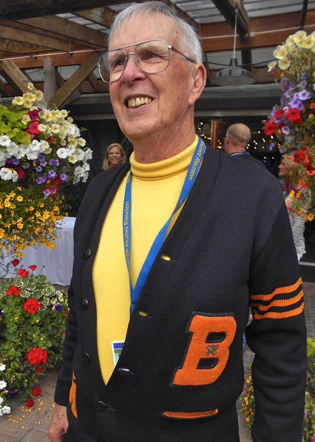 Chuck Callahan wears his 1951 Bainbridge High letterman’s sweater.