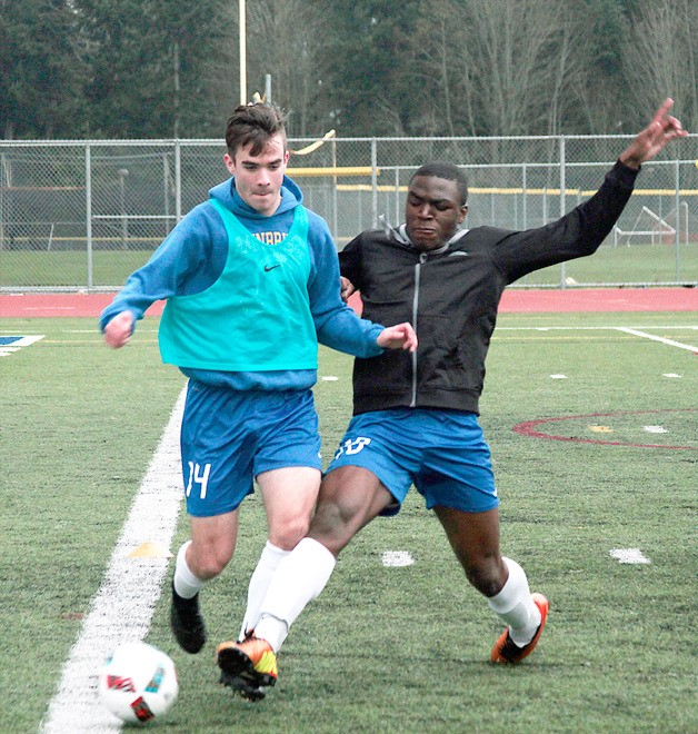 The Bainbridge High School varsity boys soccer team works through a practice session late last week.