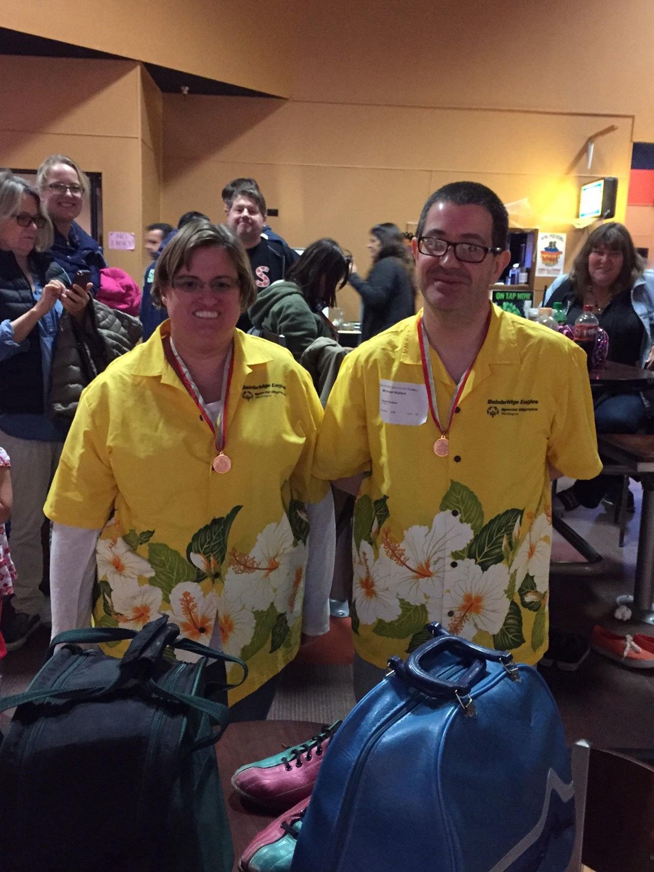 Photo courtesy of Kurt Nickel                                Rebecca Nickel and Michael Wallace competed in the team doubles event for the Bainbrigdge Island Golden Eagles Special Olympics bowling team at the recent regional tournament in Silverdale.