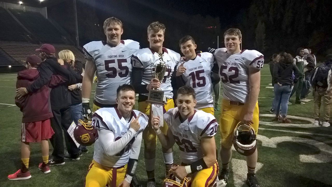 Photo courtesy of Steve Mikami                                Six Bainbridge Island athltes were among the O’Dea High School varsity football lineup that claimed the 2016 Seattle Metro League Football Championship last week. From left to right: (back row) Griffin Korican, Warren King, Cameron Mikami, Jack Markowiz, (front row) Thad Van Winkle II, Conner Gregoire.