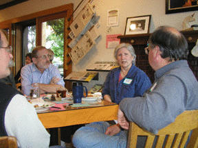 Kat Gjovik (R) and Dave Henry discuss the issues at the Conversation Cafe event at Pegasus Coffee House.