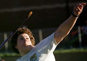 Matt Wauters eyes up the tip of his javelin before a throw in practice.