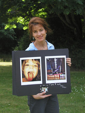 Daughter took the shot; mom holds the proof. Art docent Jennifer Callan displays the photographic self-portrait Sophia Callan made for her class assignment.