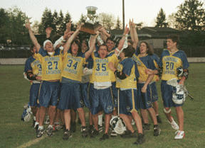 The boys varsity lacrosse team celebrates its win over Mercer Island to reclaim the state lacrosse title.