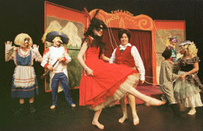 (L-R) Fifi (Vanessa Hall) and Pinocchio (Liz Ellis) dance amond the other puppets in BPA's production of Pinocchio.