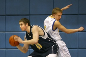 Coby Gibler battles with Bellevue’s Luke Sikma for the rebound. The Bainbridge senior post had 12 points and 13 rebounds