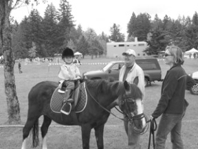 Pierre LeDorze sits on Sparkle with Art