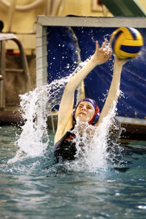 Sophomore goalkeeper Joanna Raustein blocks a shot at practice Monday. She is replacing long-time goalie Emily Lewis - lost to graduation - this season.