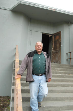 Terry Lande on the steps of the Battle Point Park transmitter building.