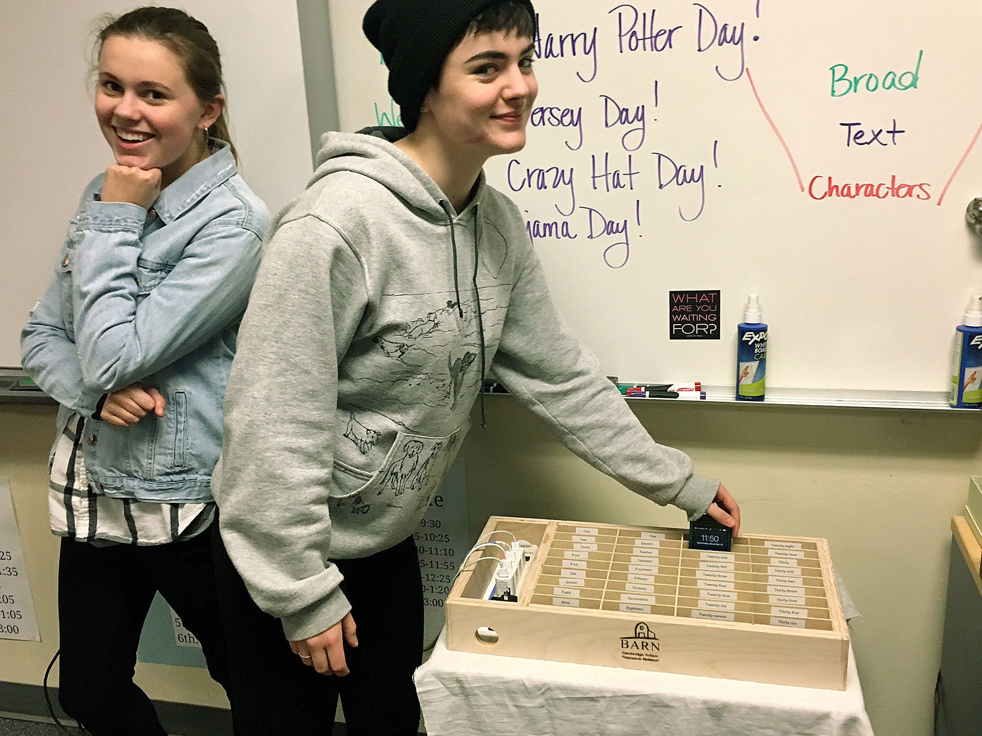Eagle Harbor High teacher, BARN woodworker create cellphone caddy to minimize classroom distractions