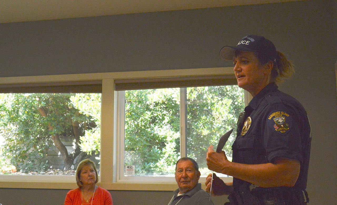 Jessica Shelton | Bainbridge Island Review                                Officer Carla Sias warns Aging Mastery Program participants of the danger of identity theft scams and how to avoid them.