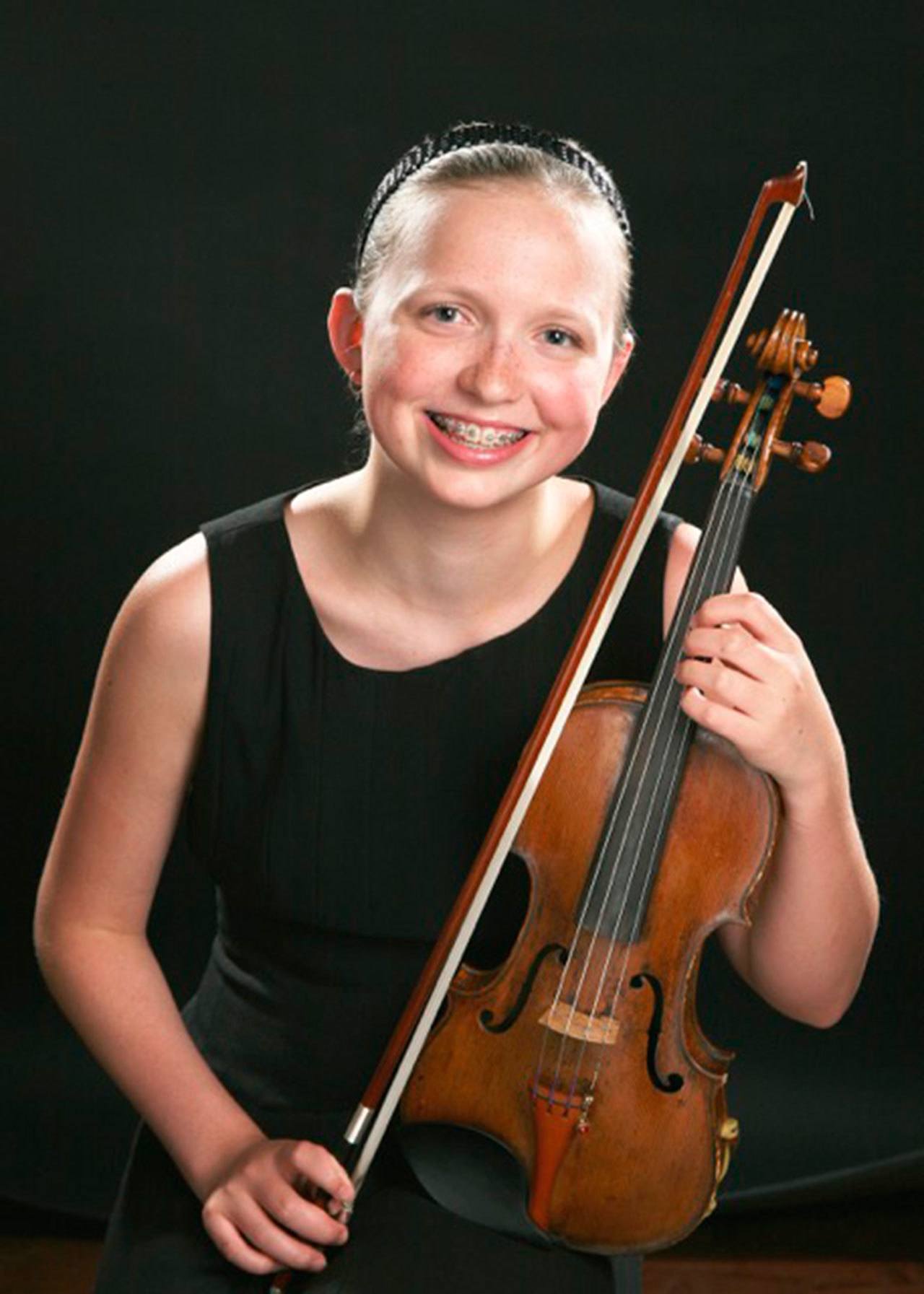 Yuen Lui Photography Studio photo                                Charlotte Marckx, a 14-year-old violinist from Bellevue, first-place 
winner of the Bainbridge Symphony Orchestra’s 2017 Young Artist Concerto Competition.