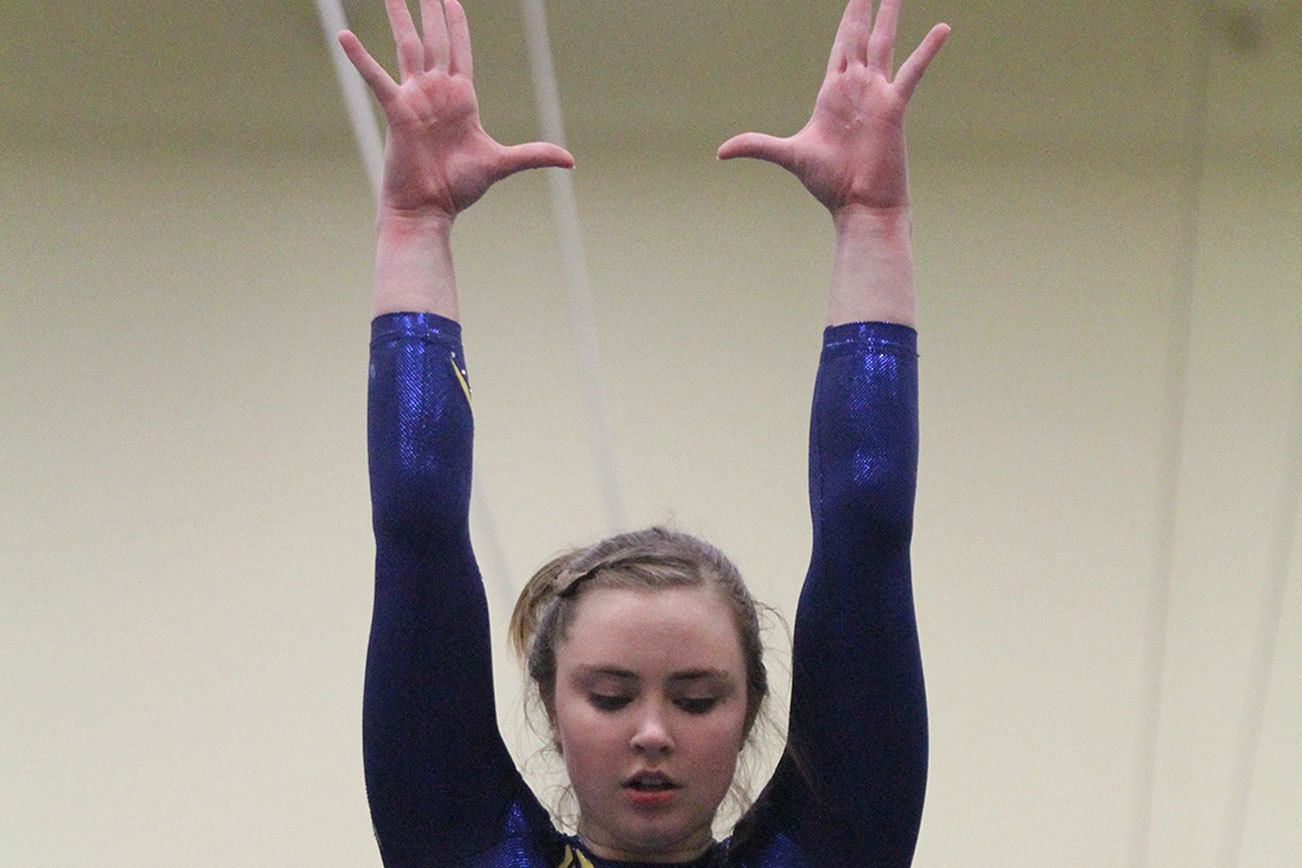 Spartan gymnasts advance to state after downer at districts