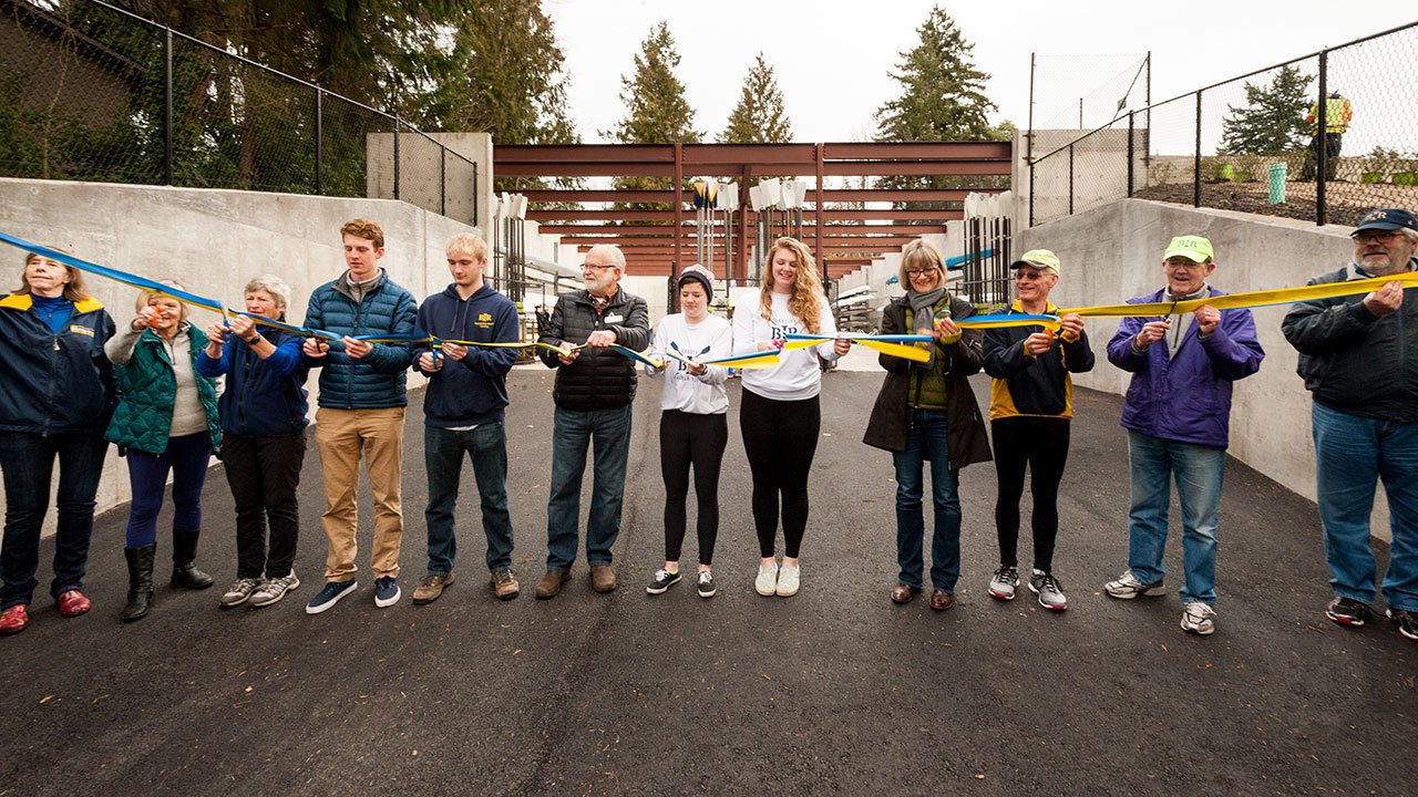 Photo courtesy of Peggy Musselwhite Rowers of many ages and experience levels came together to cut the ribbon to celebrate completion of the first stage of construction for the new Rowing Center in Waterfront Park on Saturday, Jan. 28.