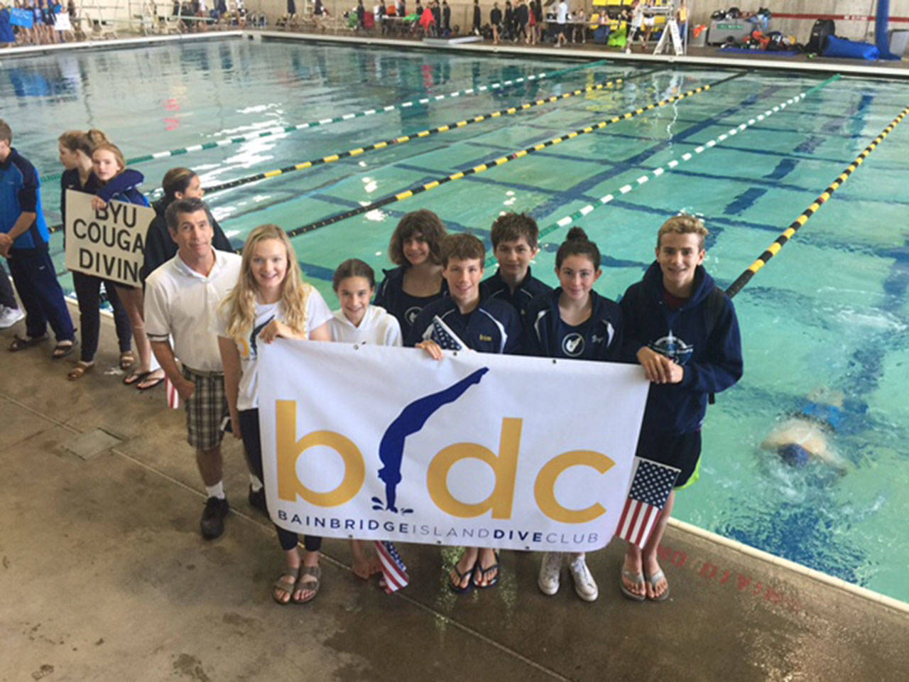 Photo courtesy of the Bainbridge Island Dive Club                                Members of the Bainbridge Island Dive Club gather for a group photo at the USA Diving National Preliminary Zone E Championships in Beaverton, Oregon.