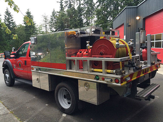 Photo courtesy of the Bainbridge Island Fire Department                                The Bainbridge Island Fire Department’s Brush 21 is a specially designed rig outfitted with pumps and other equipment for battling wildland fires.
