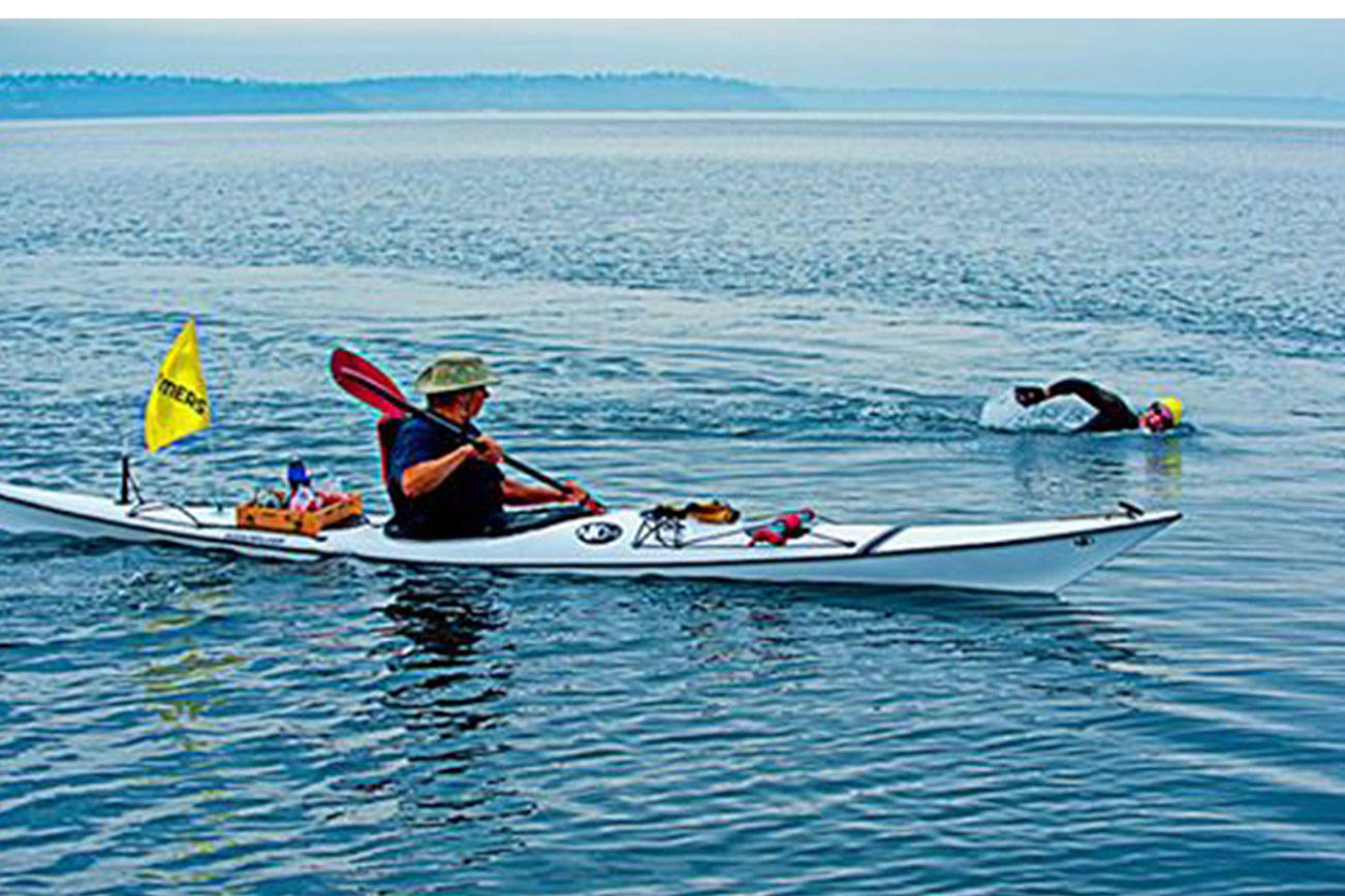 Bainbridge charity group swims around island raising funds for sick residents