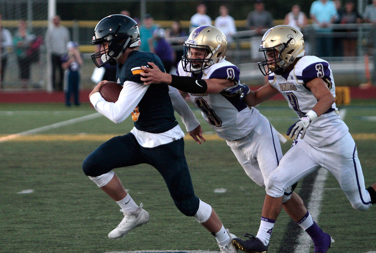 Spartans stumble in first football outing | Photo gallery