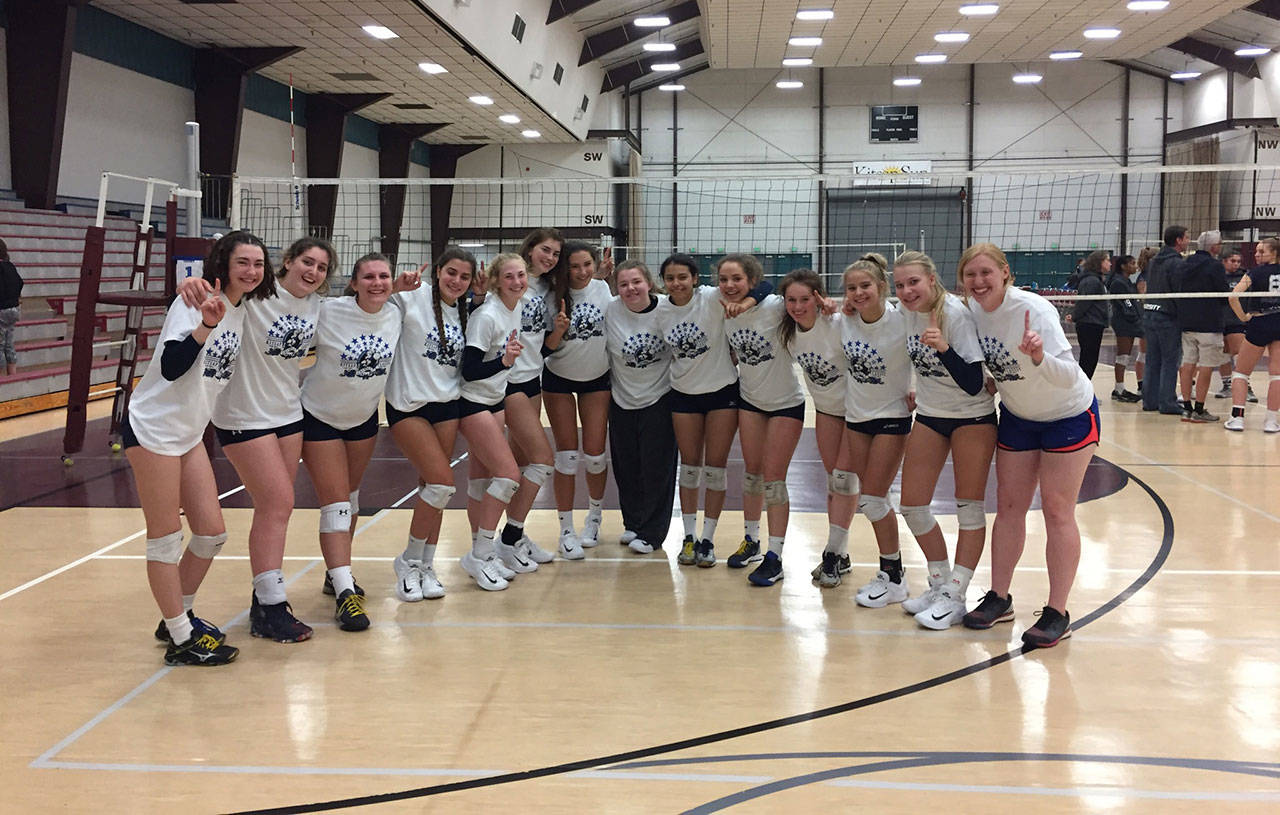 The Bainbridge Spartans volleyball team gathers for a team picture after winning the Kitsap Classic Volleyball Tournament. (Photo courtesy of Dominique Atherley)