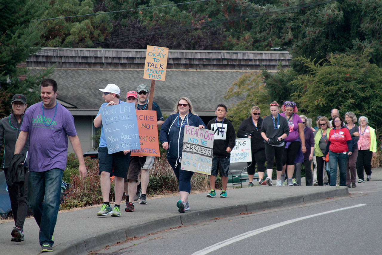Luciano Marano | Bainbridge Island Review - The 2017 Kitsap Out of the Darkness suicide prevention awareness walk trekked through Winslow Saturday.